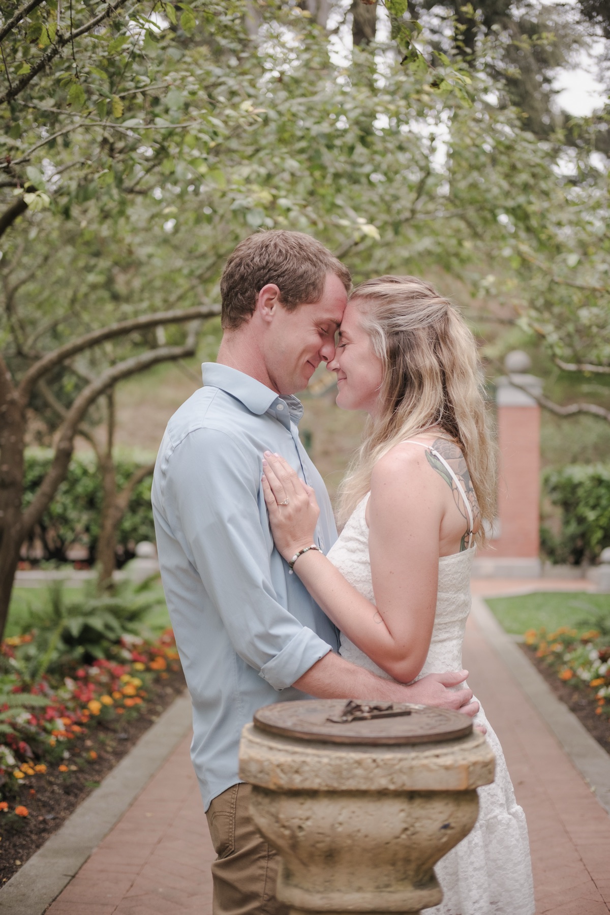 Couple sharing a tender moment during a San Francisco engagement session, photography by Matt Dea