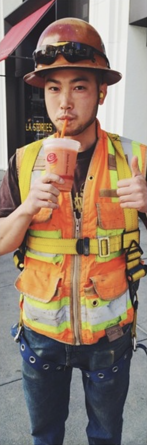 Matt Dea wearing a hard hat at a construction site in San Francisco