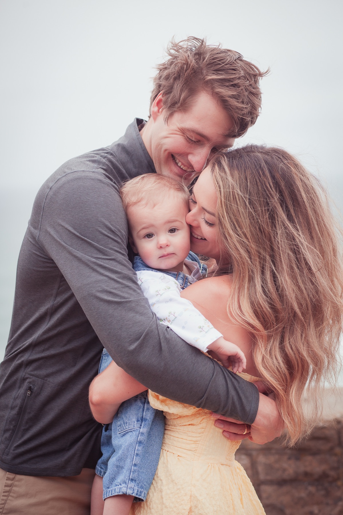 Parents and children in a candid moment at a Crissy Field fall mini session, San Francisco