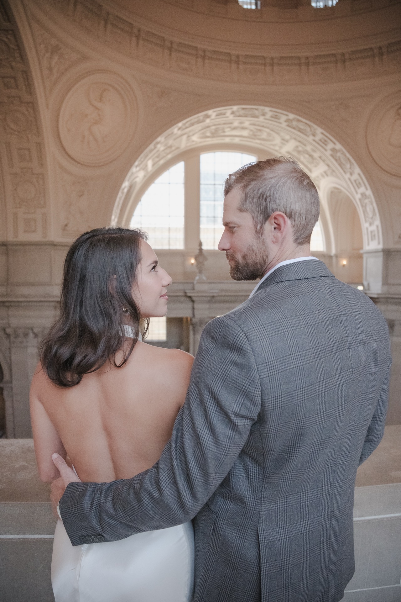 Georgette and Nick sharing a quiet moment at San Francisco City Hall, wedding photography by Matt Dea