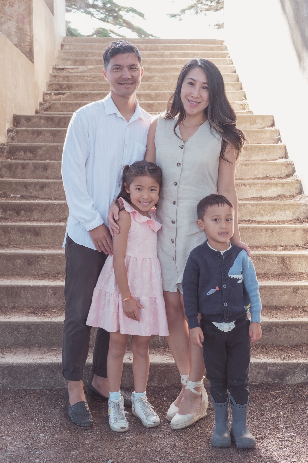 The Hou Family on a staircase during a mini session — family photography by Matt Dea