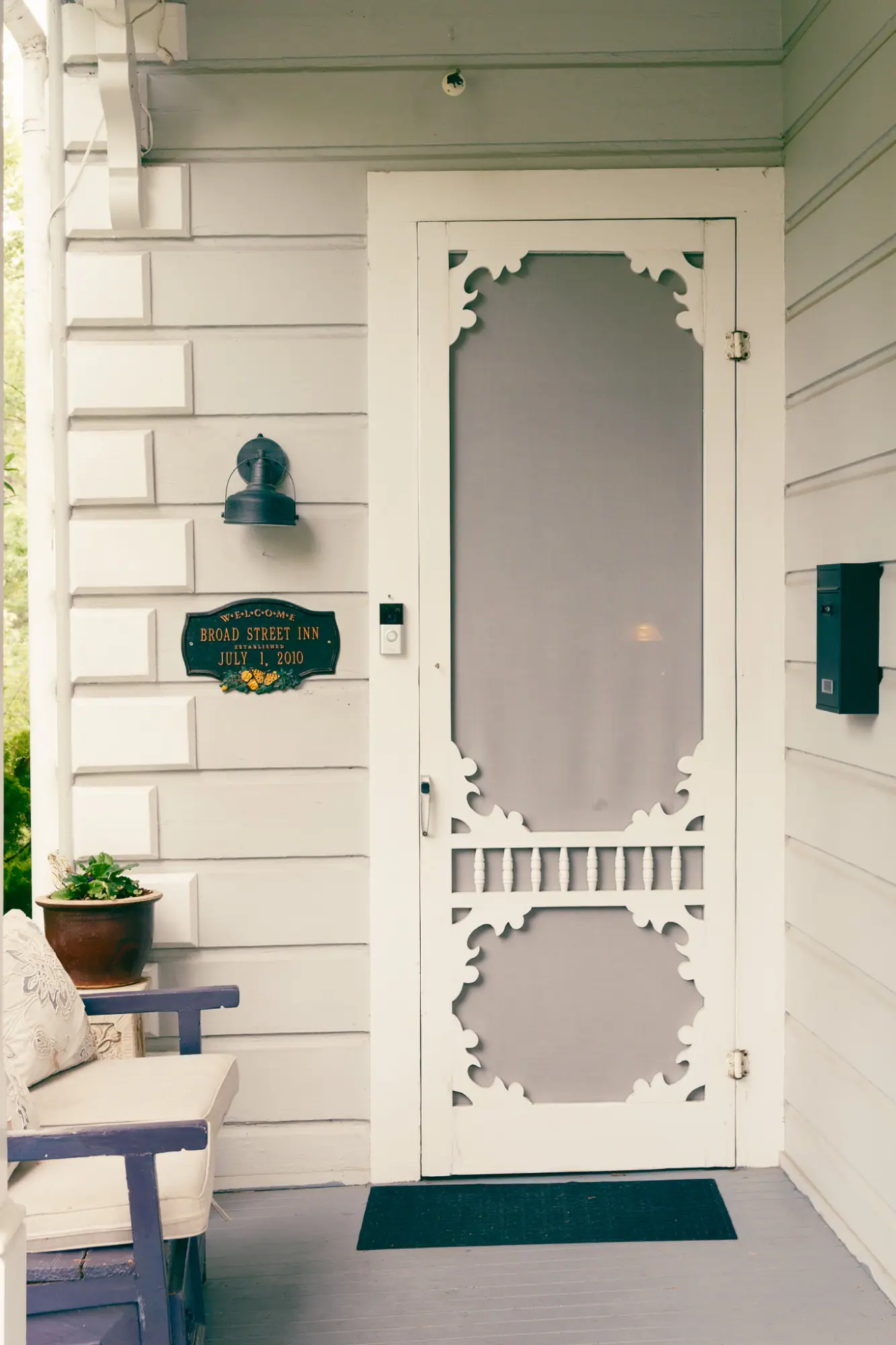 The inn's white screen door