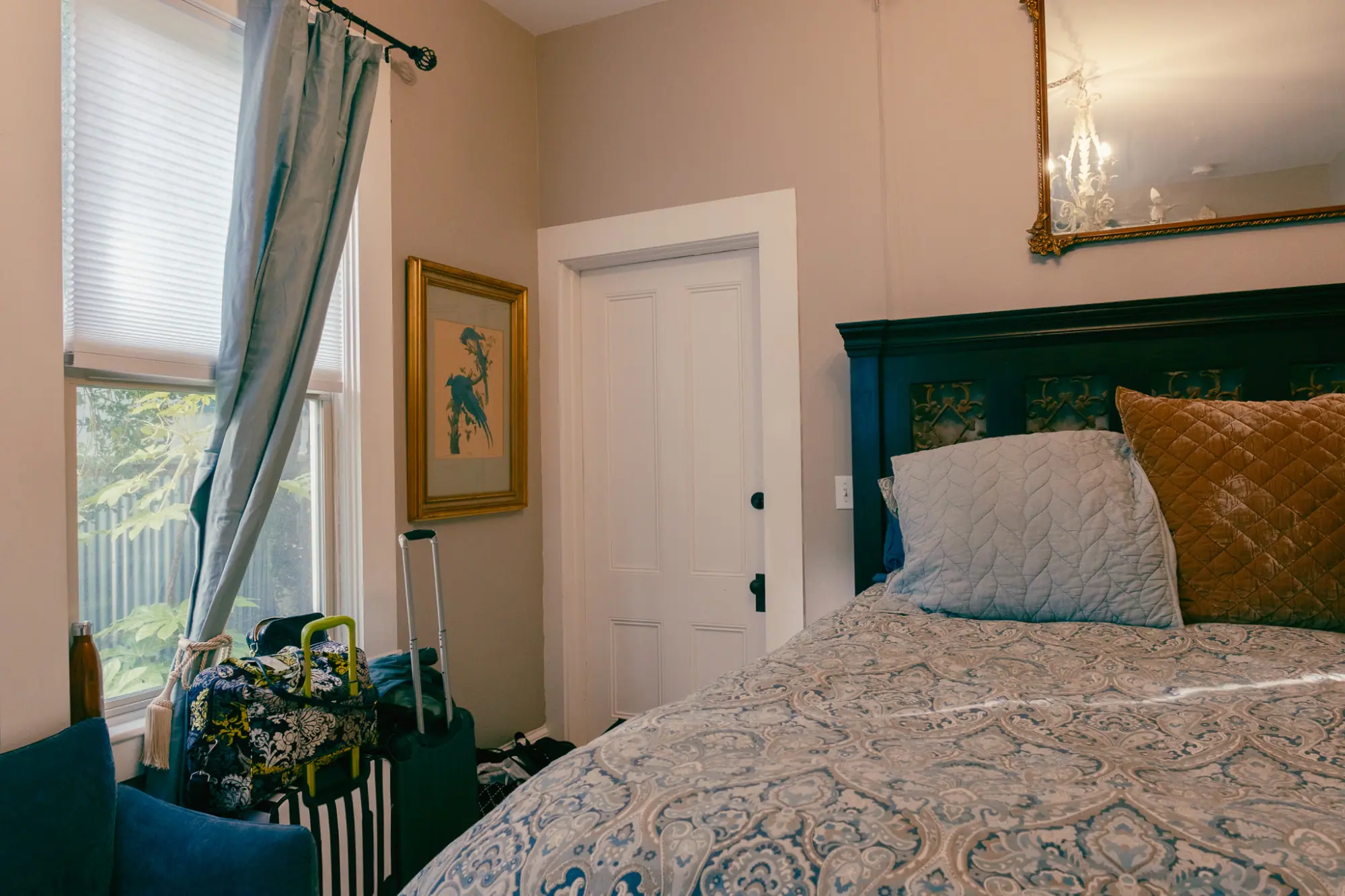 The bed and window in the guest room