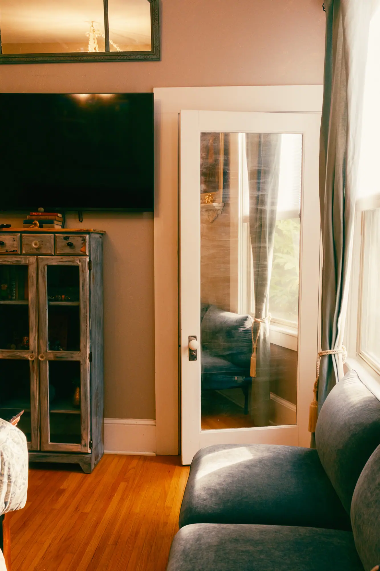 Broad Street Inn room with a leather chair and French doors