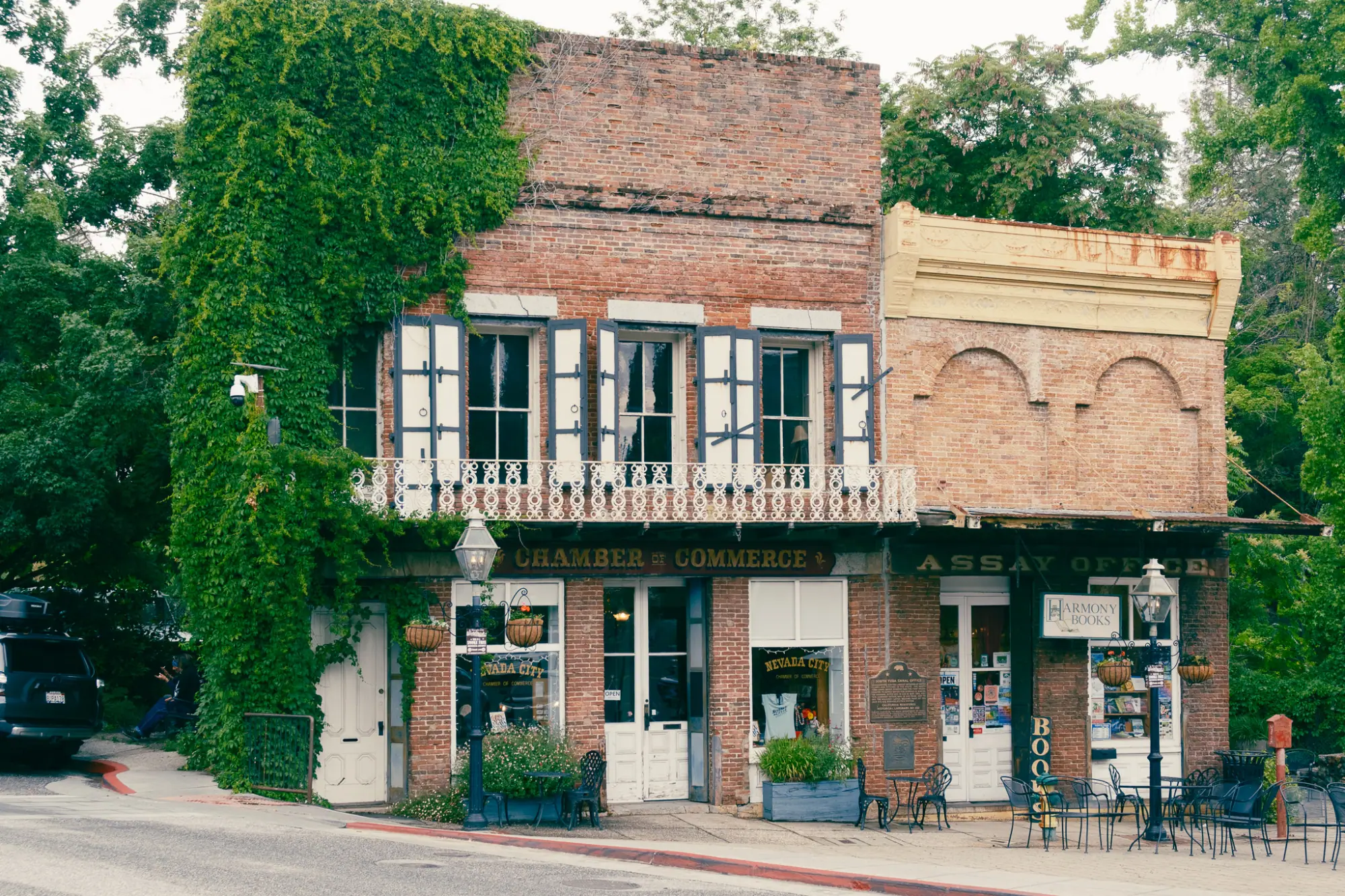 Ivy-covered brick storefronts