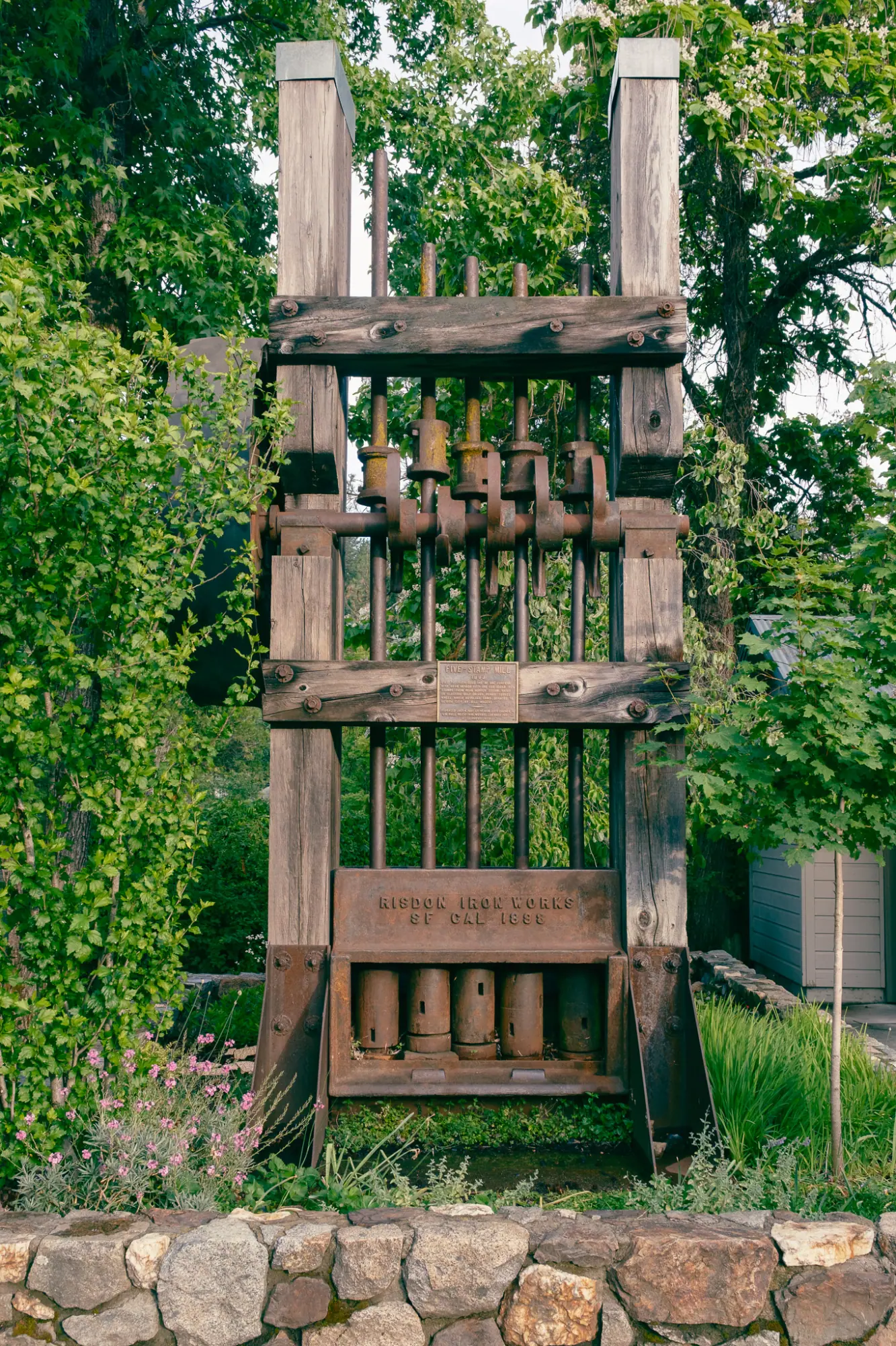 An antique ore stamp on display