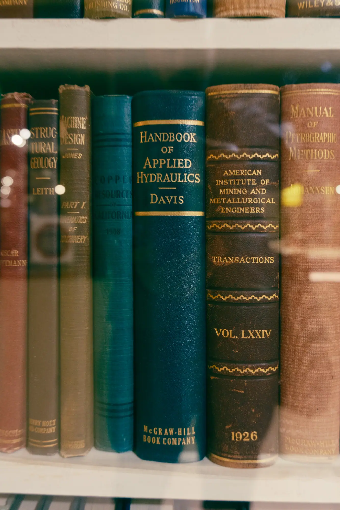 Old mining reference books in a museum case