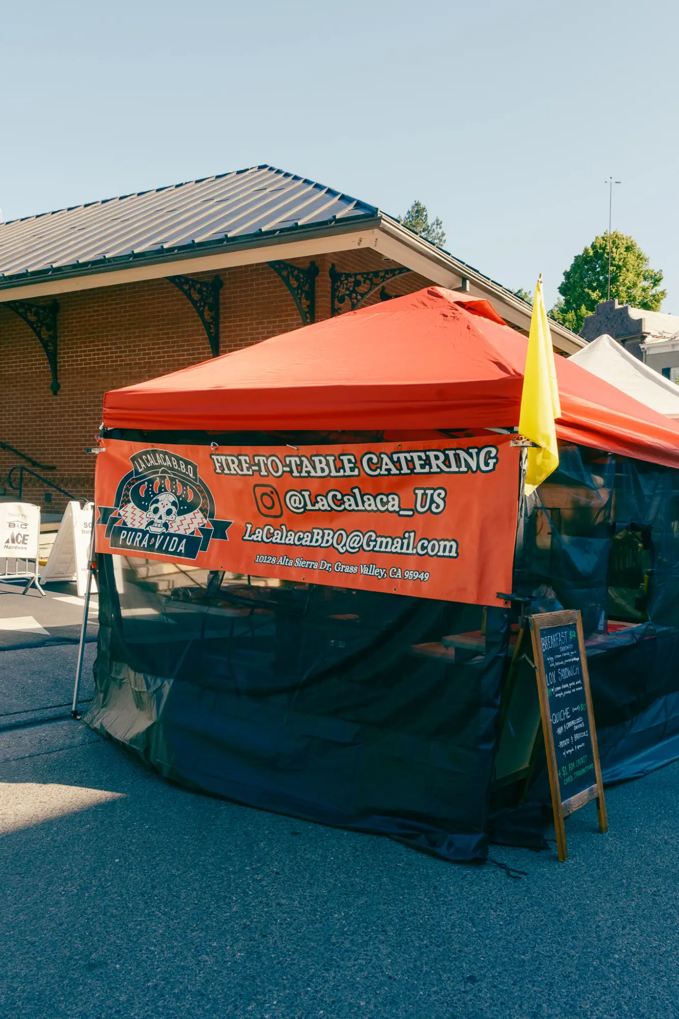 A red catering tent at the market