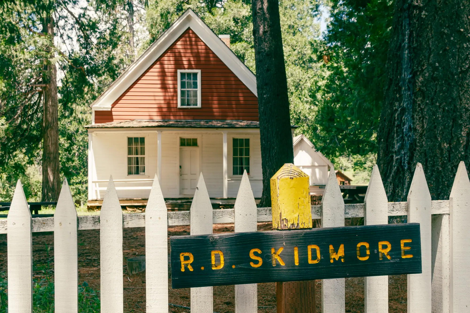 The R. D. Skidmore house behind a picket fence