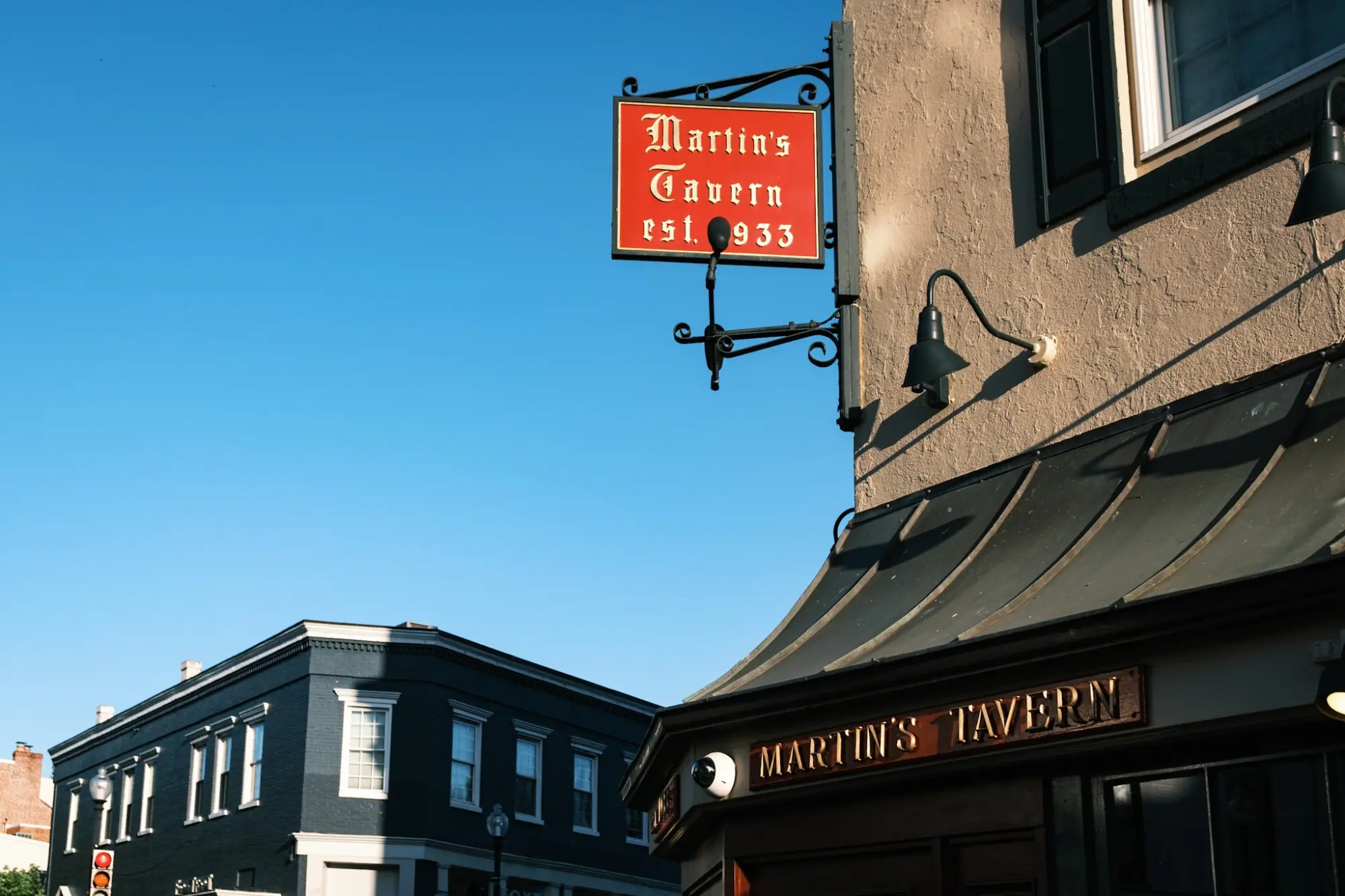 Photo from As golden hour hit, we ducked into Martin’s Tavern, a historic pub with wood-paneled walls and an old D.C, Washington, DC