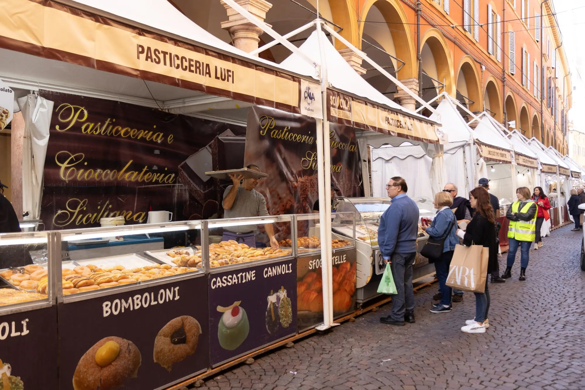 Photo from And then, unexpectedly, we stumbled into the Modena Chocolate Festival — rows of stalls set up throughout…