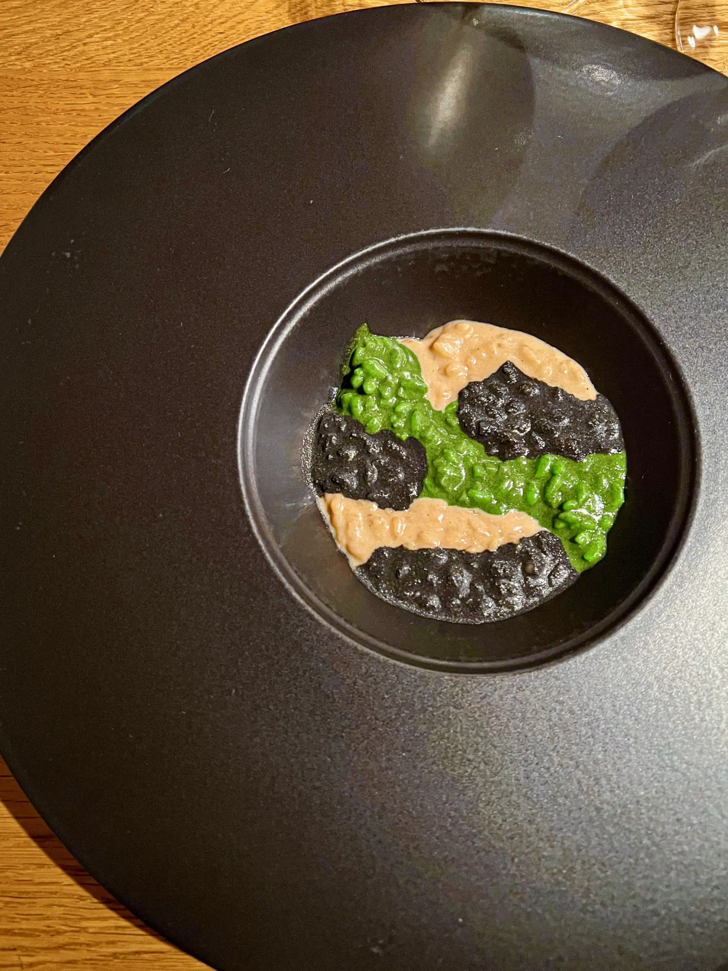 Riso Camouflage Camouflage, but edible — a risotto painted in game, forest, and earth tones. Think hare ragù, chlorophyll, and black truffle, each bite a surprise hiding in plain sight. A dish that makes you look twice, then taste three times.