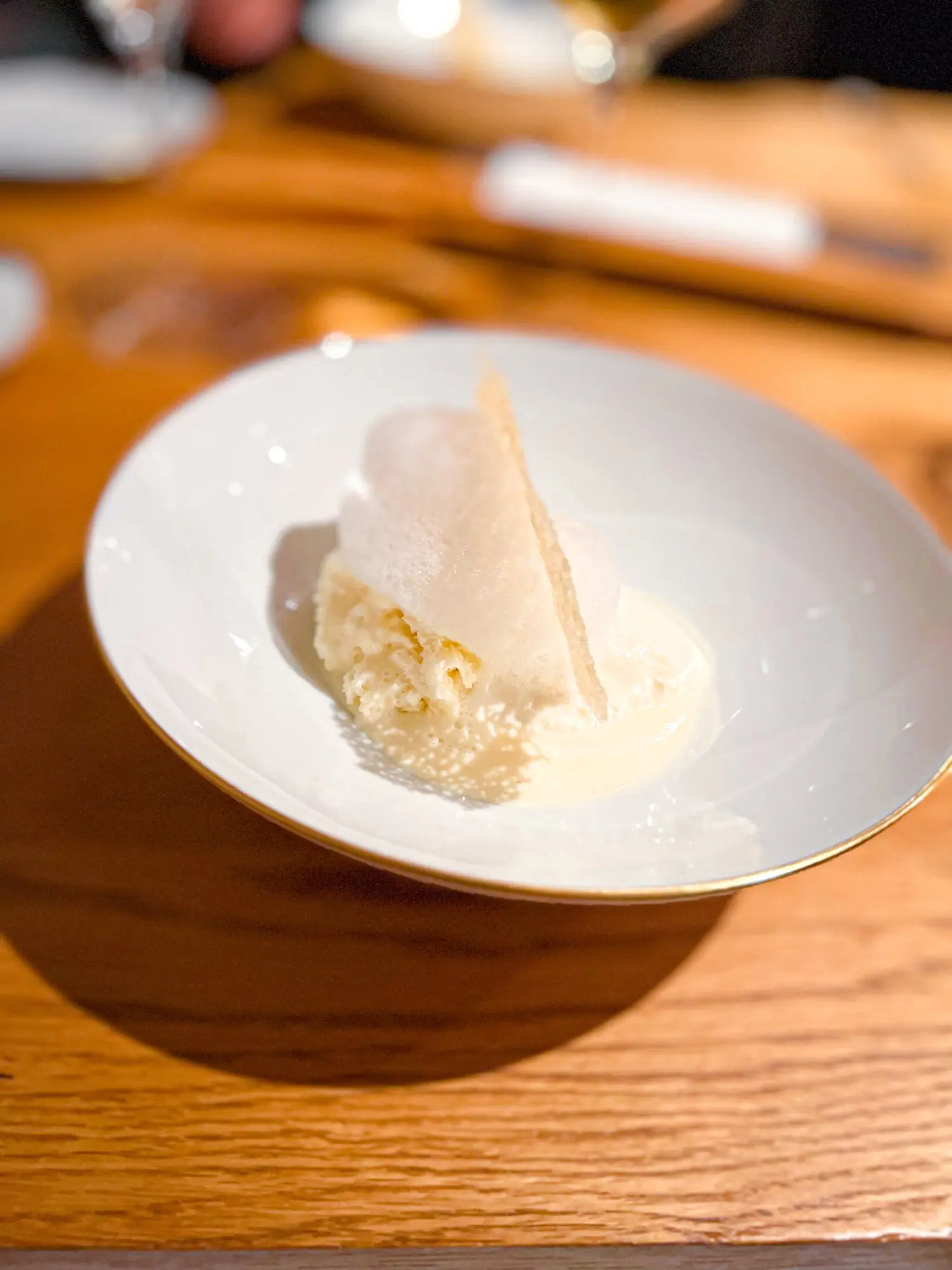 Five Ages of Parmigiano Reggiano One ingredient, five ways — warm, cold, airy, creamy, crisp. An ode to Parmigiano through the lens of memory, invention, and obsession. One of Bottura’s most brilliant signatures.