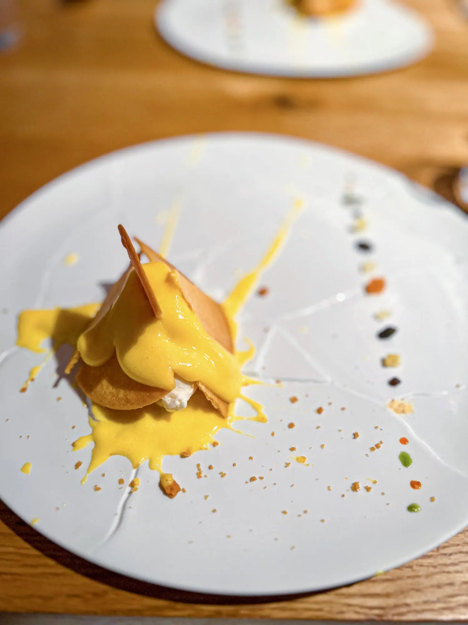 Oops! I Dropped the Lemon Tart What happens when a perfect dessert hits the floor? Bottura turns the accident into art — a deconstructed tart splattered across the plate with intention and joy. Imperfection has never tasted so good.