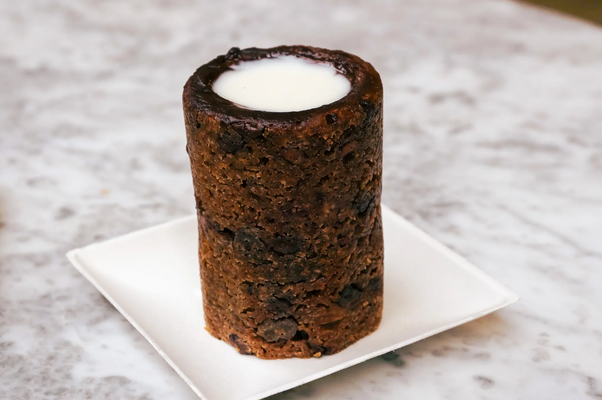 Chocolate-chip cookie shot filled with milk