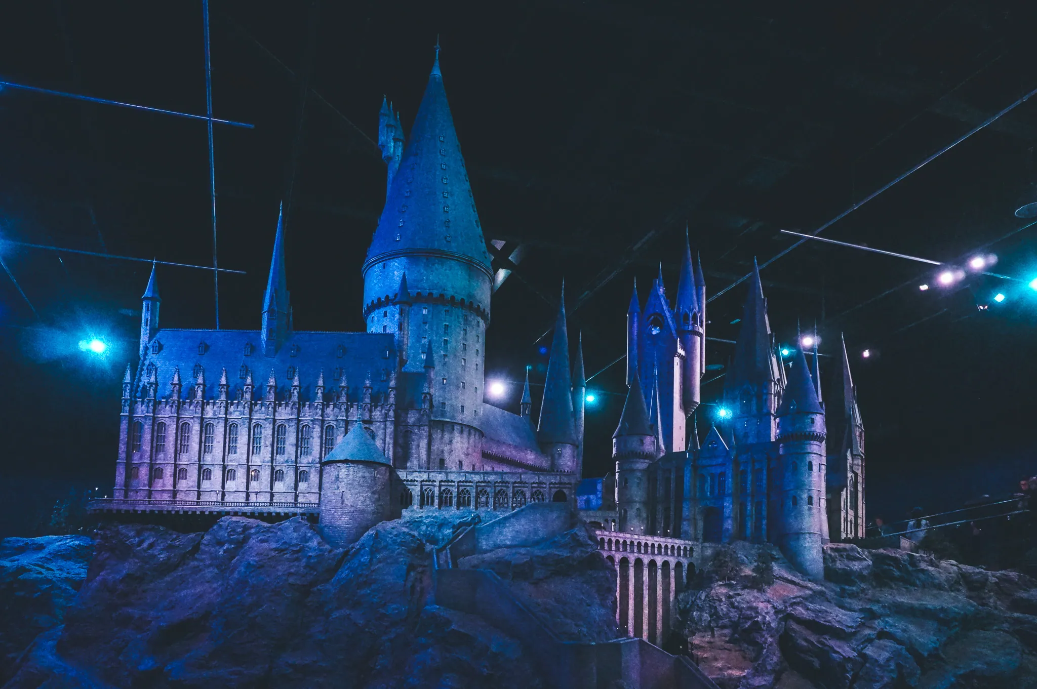 Hogwarts castle model under blue light