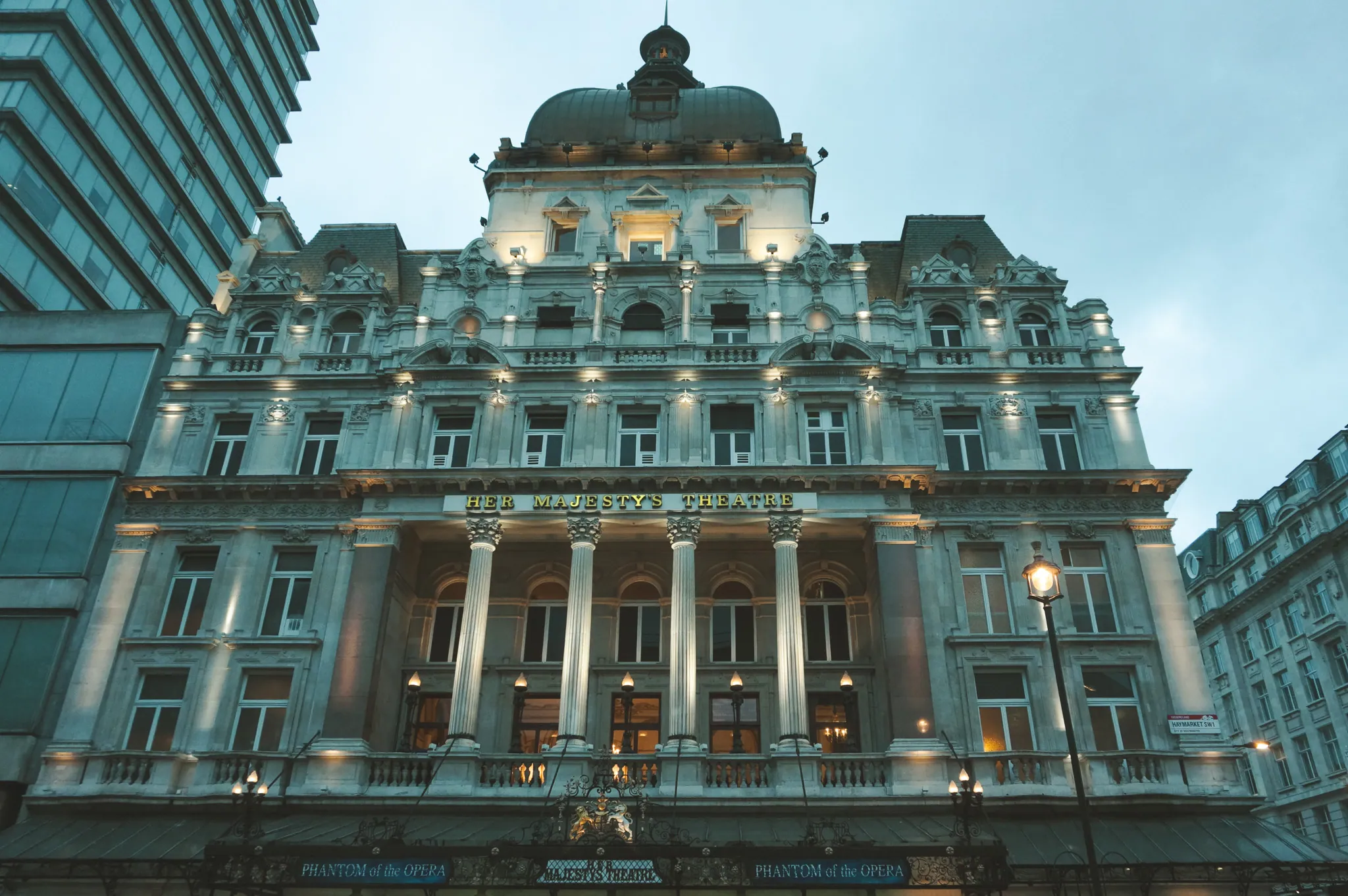 Theatre facade lit at dusk (Phantom of the Opera)