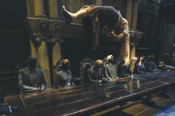 Malfoy Manor dining table with floating figure
