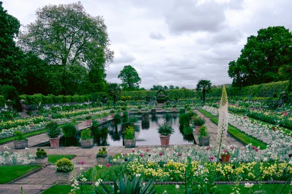 Sunken garden pond with flower beds