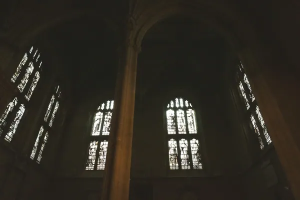 Dark vault and stained-glass windows