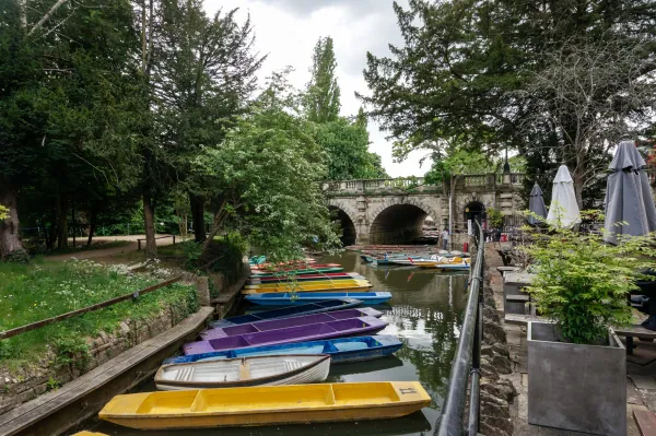 Punts moored by the bridge