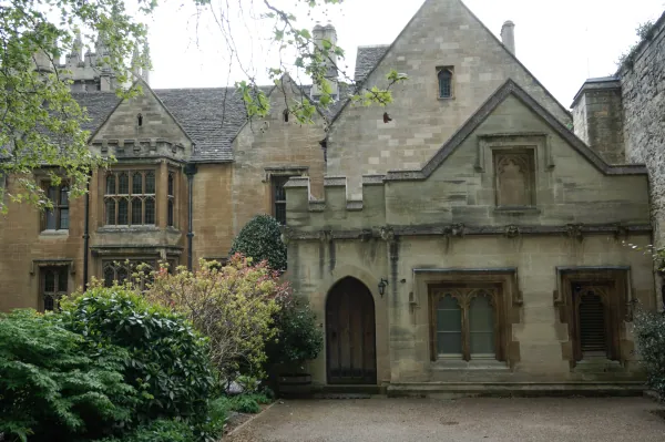 Gabled stone house with arched door