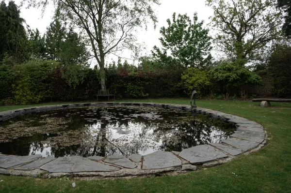 Round pond in a lawn