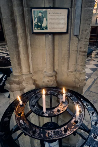 Candle stand at a pillar
