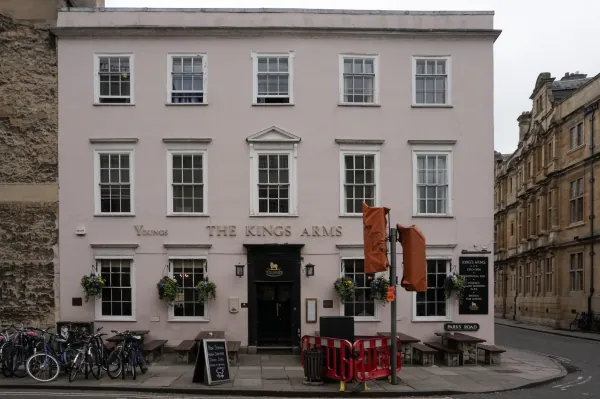 Pink-fronted pub with bikes
