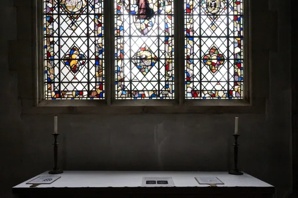 Altar table under stained glass