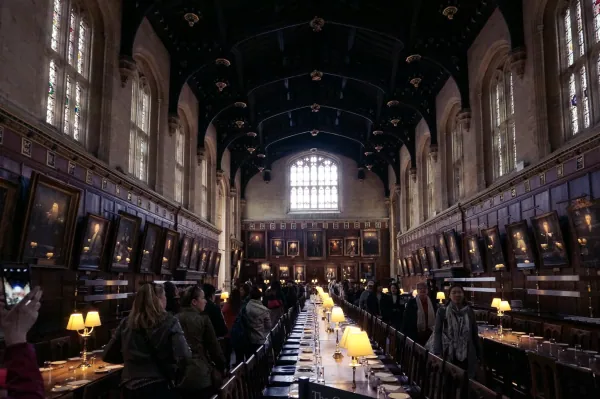Hall with tables and portraits