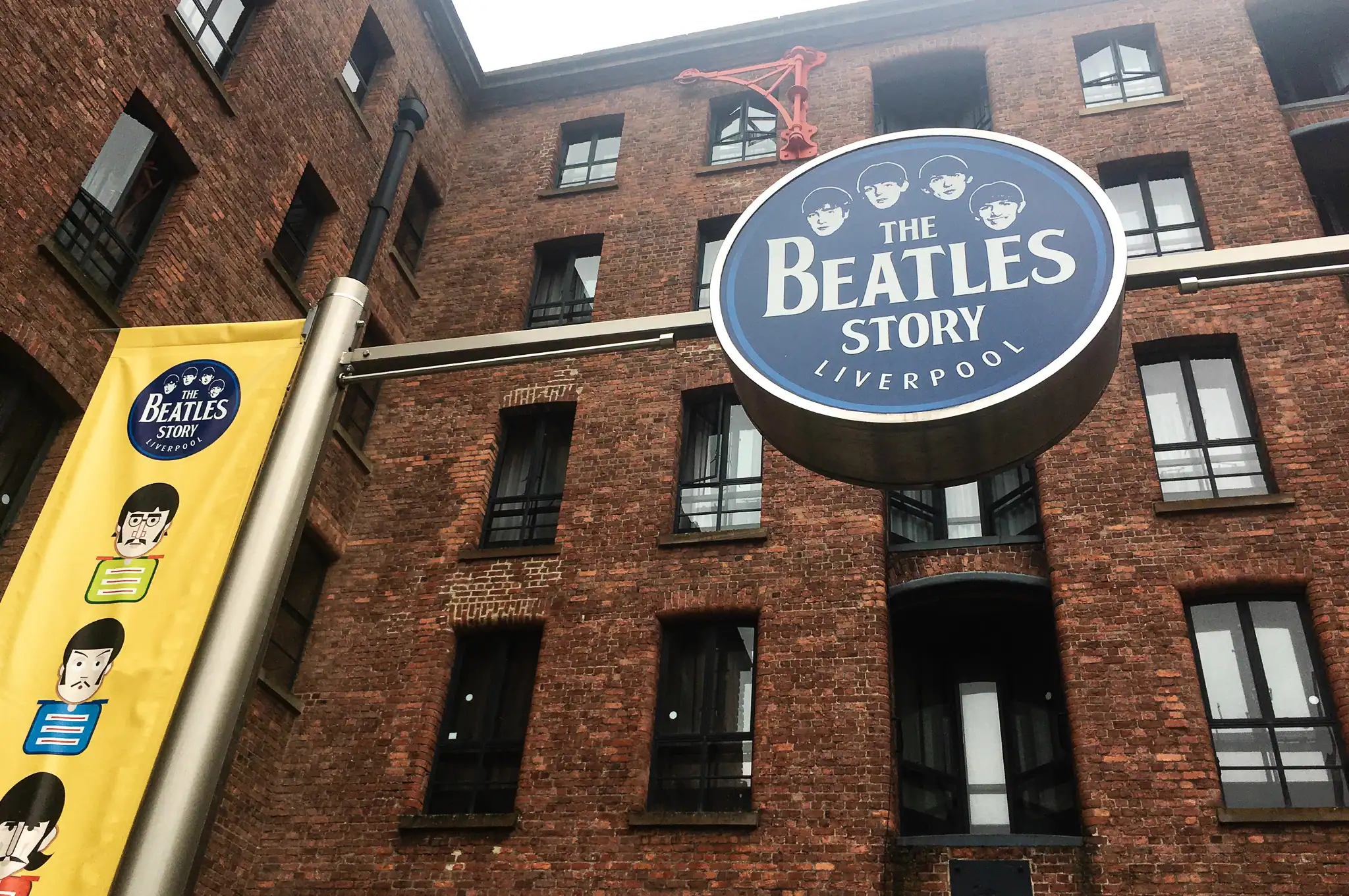 Beatles Story sign on a brick warehouse