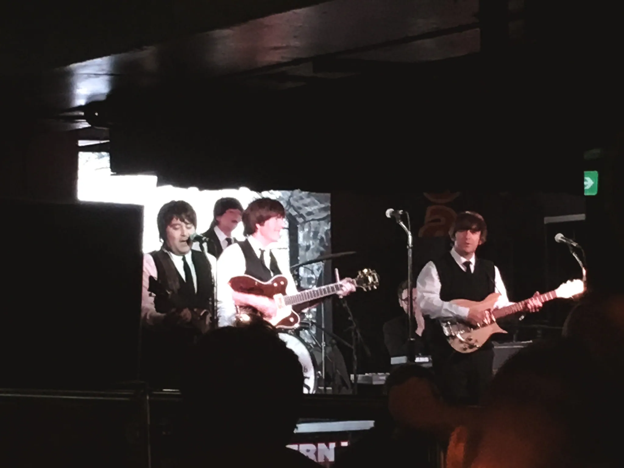 Beatles tribute band on stage