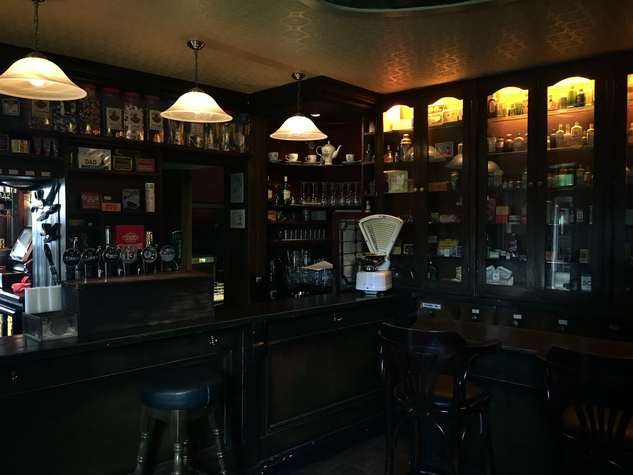 Pub interior with old shop shelves