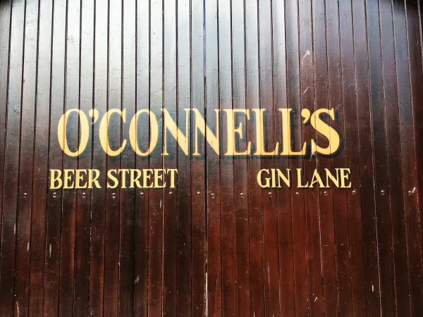 "O'Connell's Beer Street Gin Lane" sign