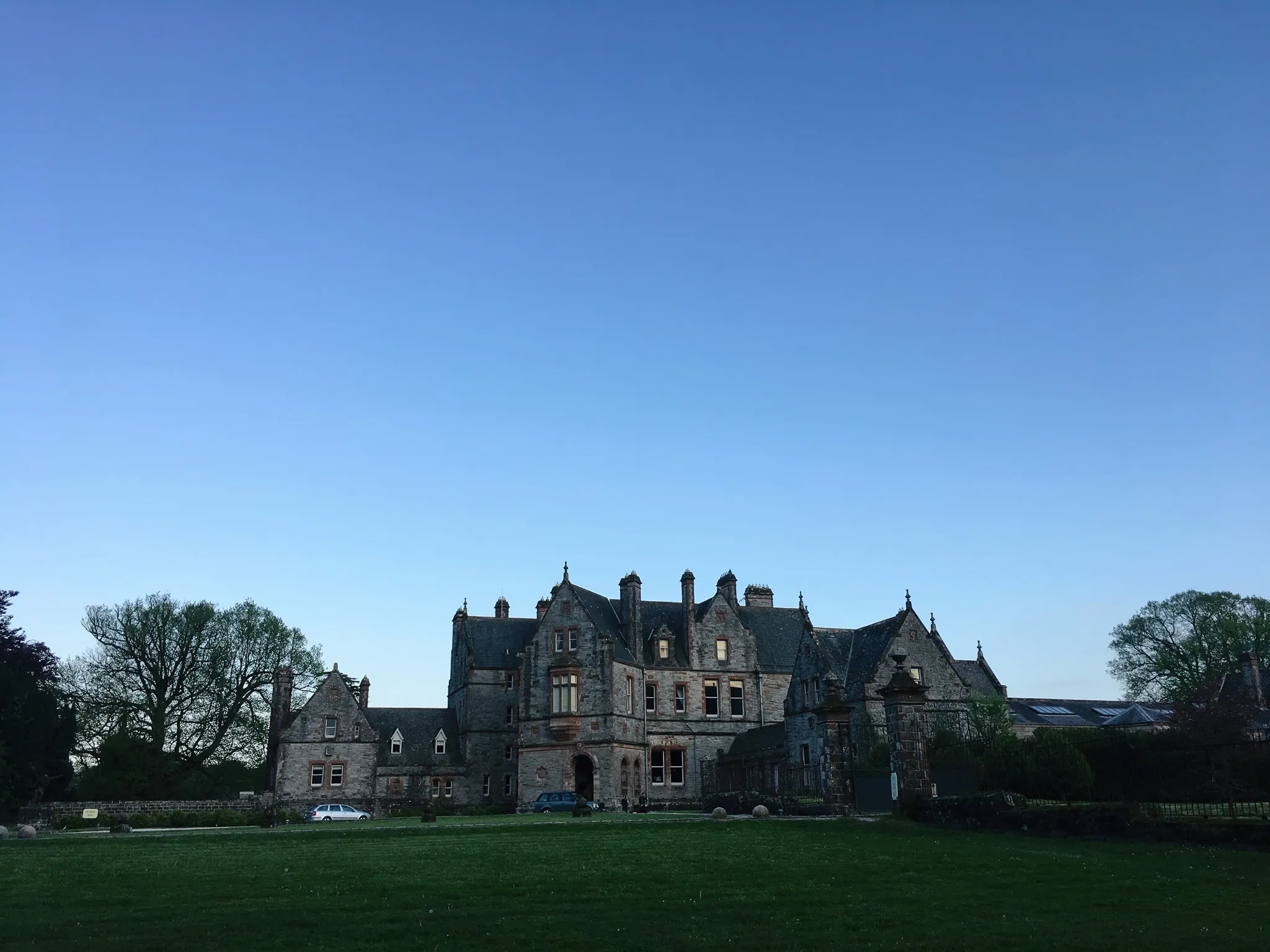 Castle across the lawn at dusk