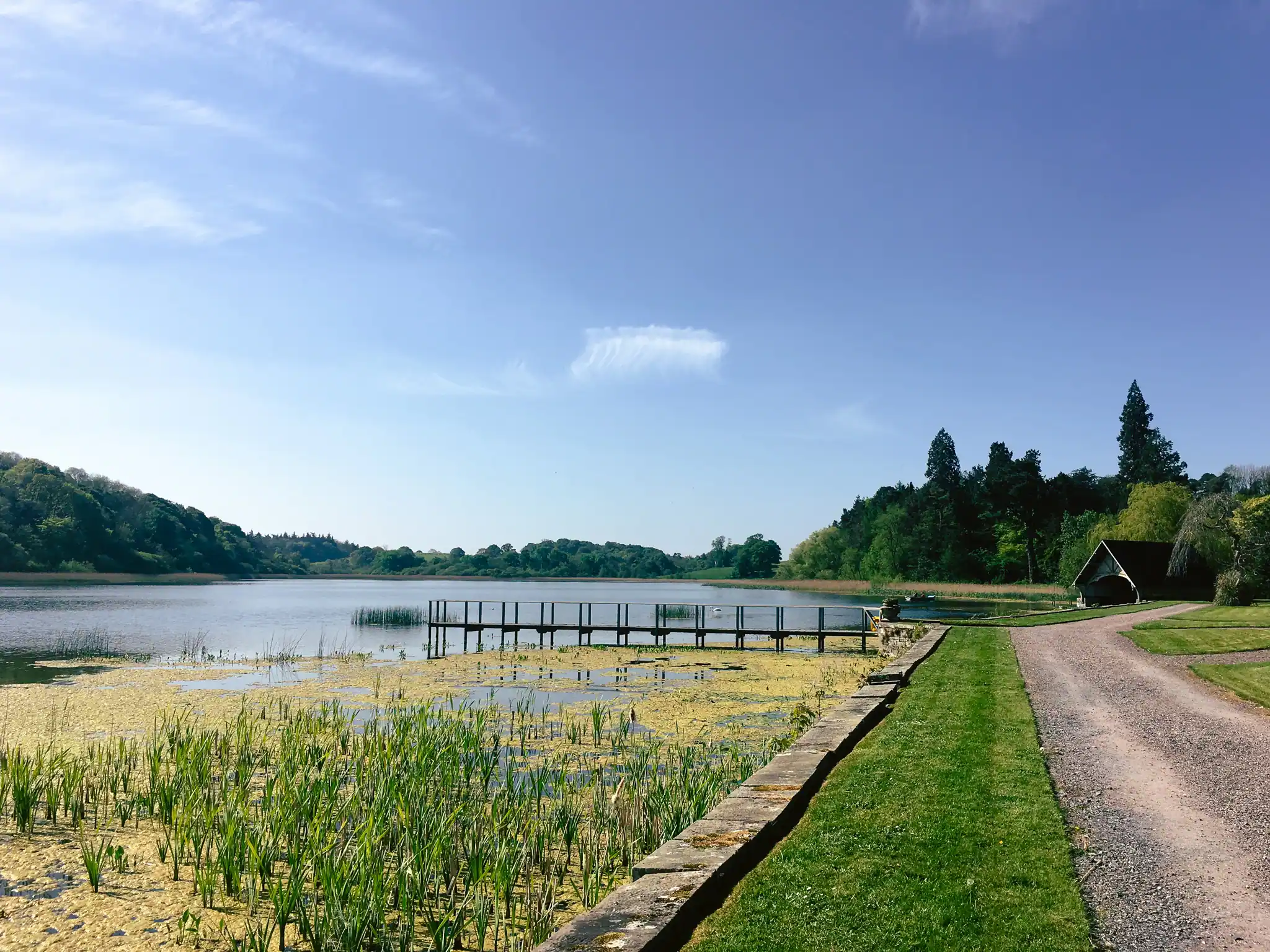 Lake with jetty and lakeside path