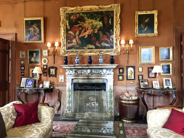 Drawing room with fireplace and painting